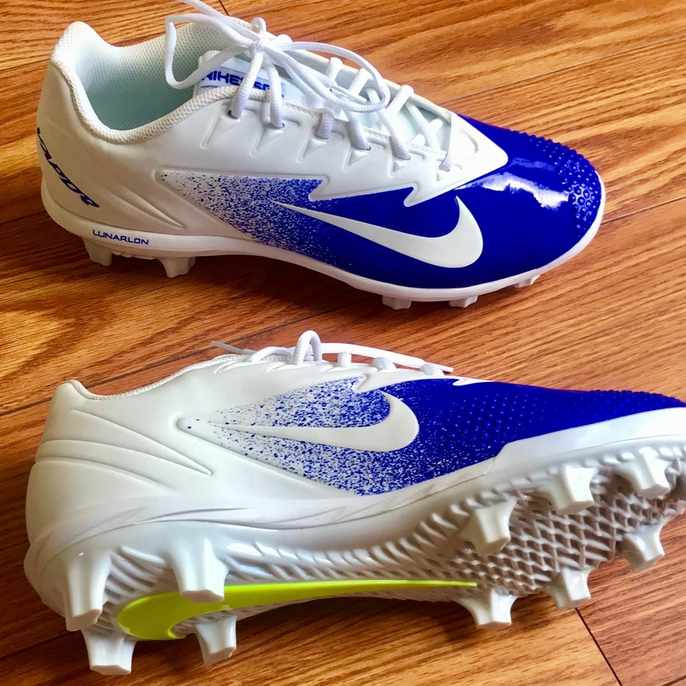 Men’s size 11.5 blue and white Nike cleats. New.